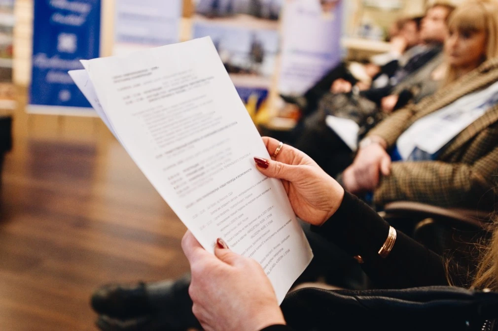 A Woman Holding Her Executive Resume