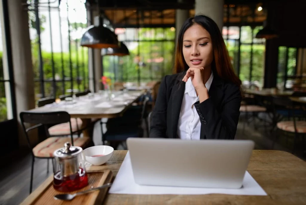 Female Job Seeker About To Take A Free Career Quiz On Her Laptop E1616129470393