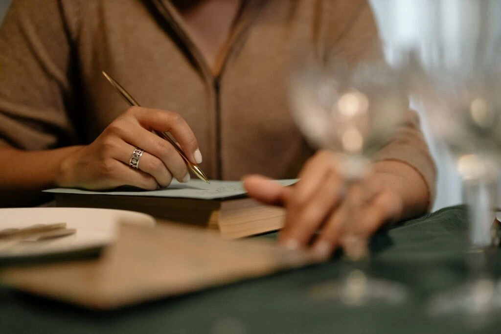 A Woman Writing On The Paper 1024X683 1