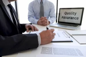 Quality Assurance Specialist Reviewing Policies And Standards