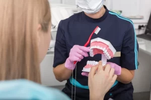 Dental Hygienist Holding Toothbrush And Teeth Mockup Design