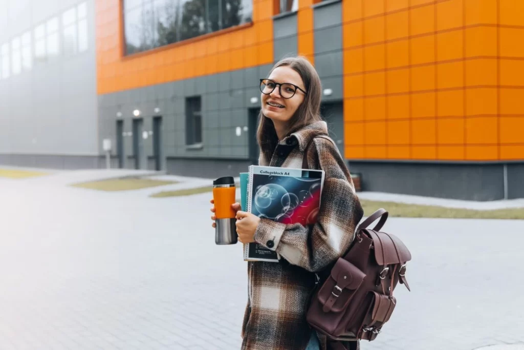 High School Student Walking Inside Campus E1655702479696