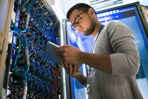 Man Network Engineer Holding Document Server