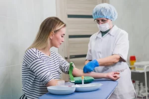 Phlebotomist Conducting Procedure