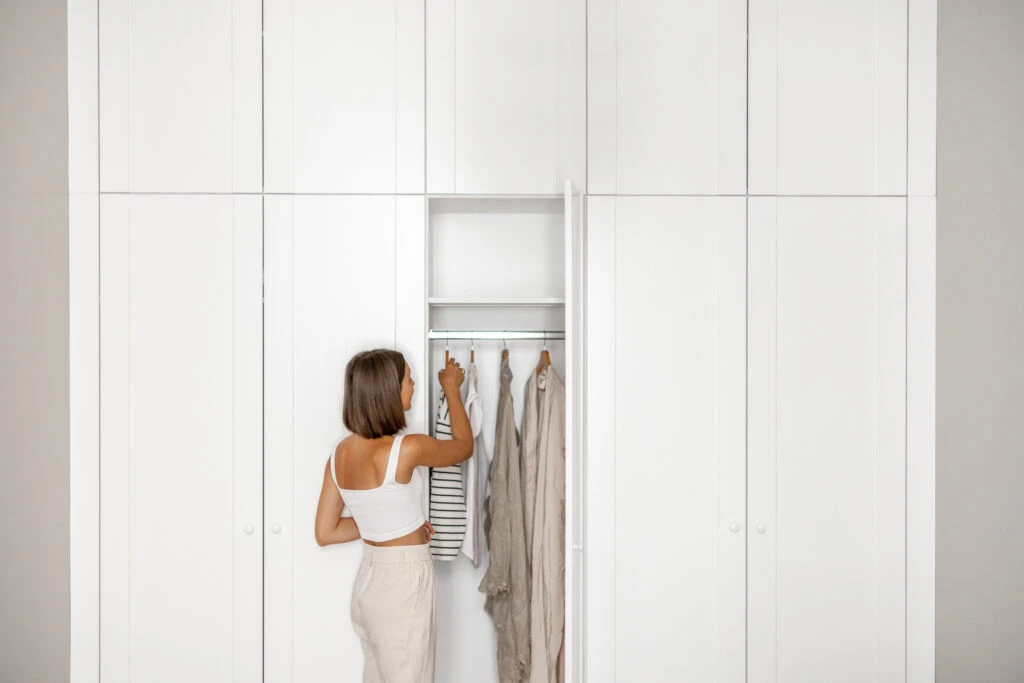 Woman Choosing What To Wear For Retail Job Interview 1024X683 1