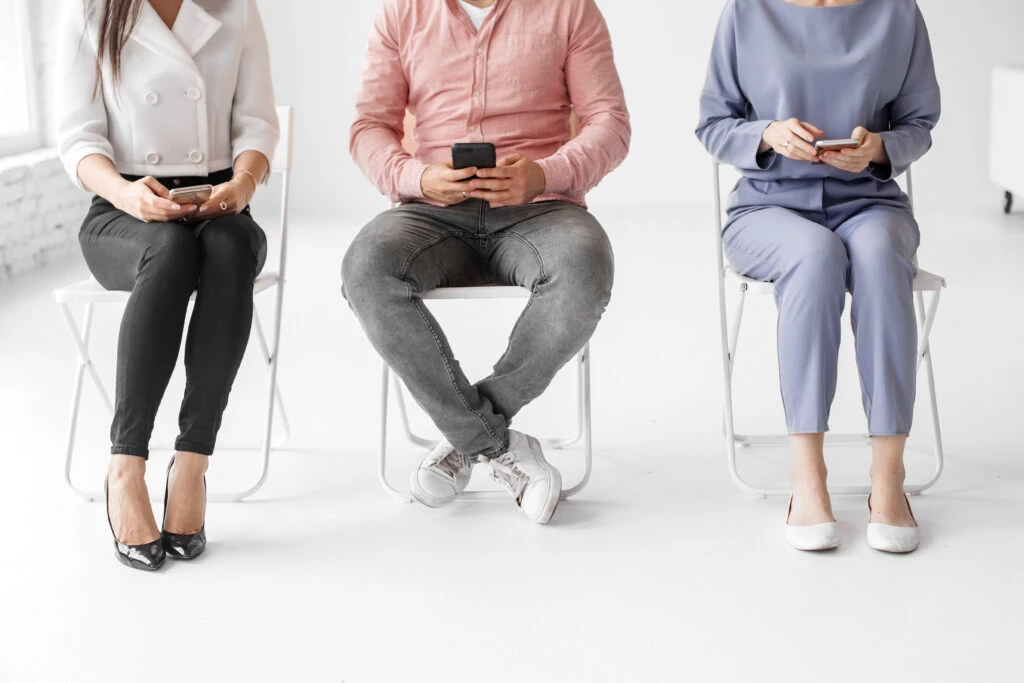 Group Of People Sitting On Chairs On A Panel Interview 1024X683 1