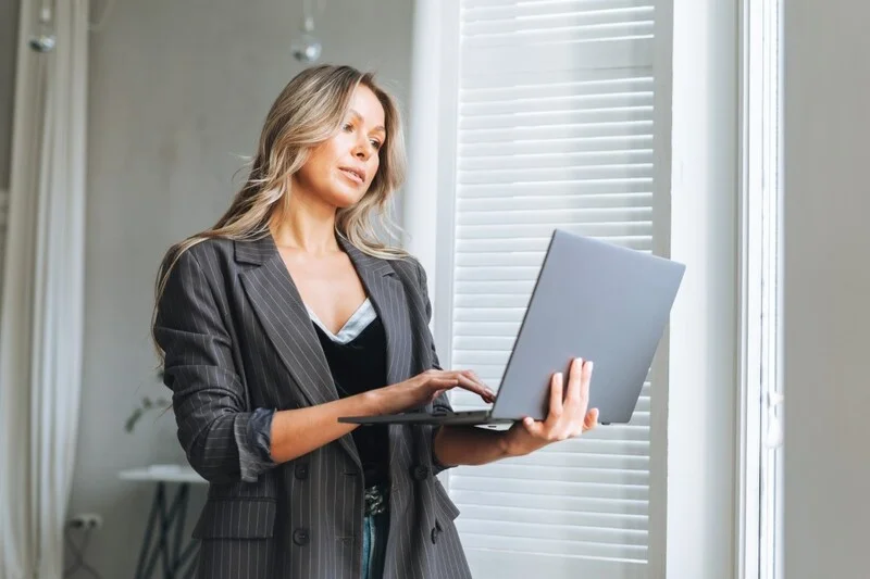 It Manager Holding Laptop