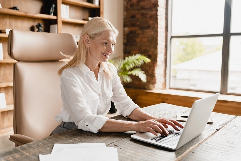 A Professional Teacher Working On Her Academic Advisor Resume