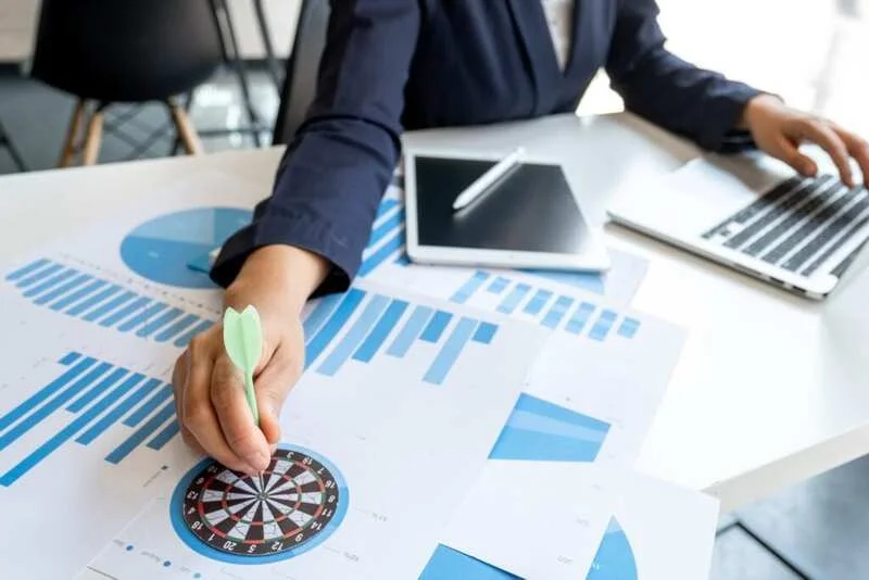 Businesswoman Analyzing The Charts For Setting Company Goals 1024X683 1