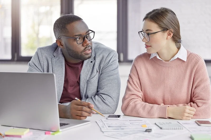 Career Expert Talking Young Professional 1