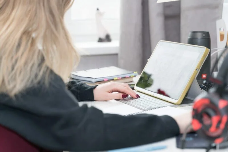 Girl Heeding Tips On How To Write A Resignation Letter On Her Computer 1024X683 1