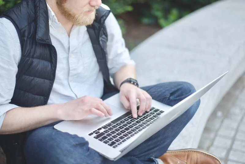 Man Writing Interview Follow Up Email 1024X684 1