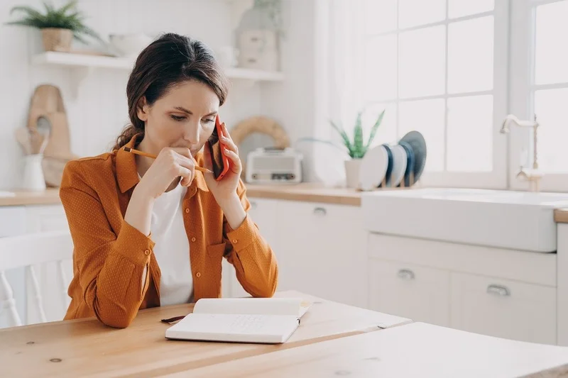 Sad Woman Talking Phone Apologizing Job Interview Reschedule 1