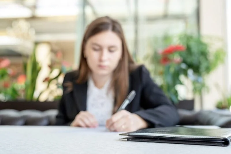 Young Job Seeker Writing Her Resume 1024X683 1