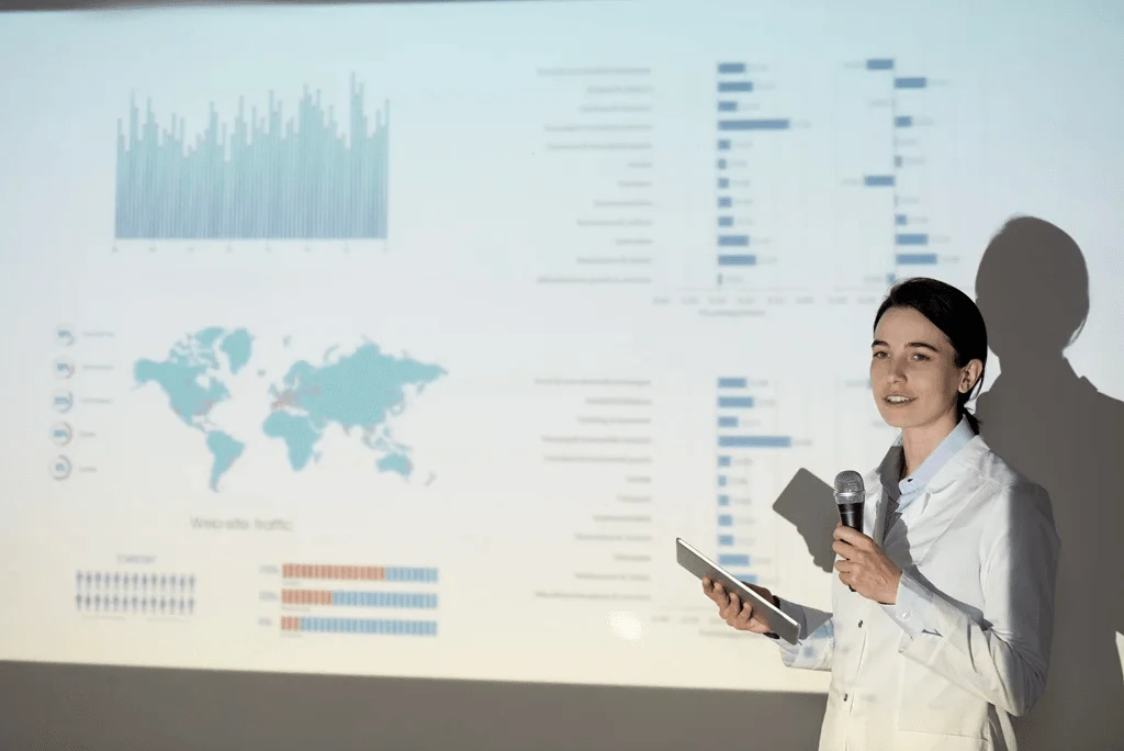 Medical Professional Using Her Communication Skills During A Presentation