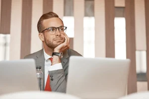 a guy thinking about the perfect attire for his job interview