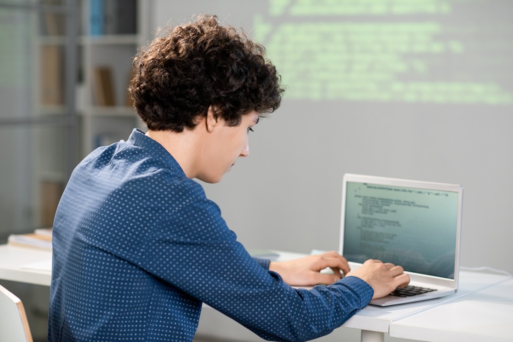 Graduating Student Editing His Linkedin Profile