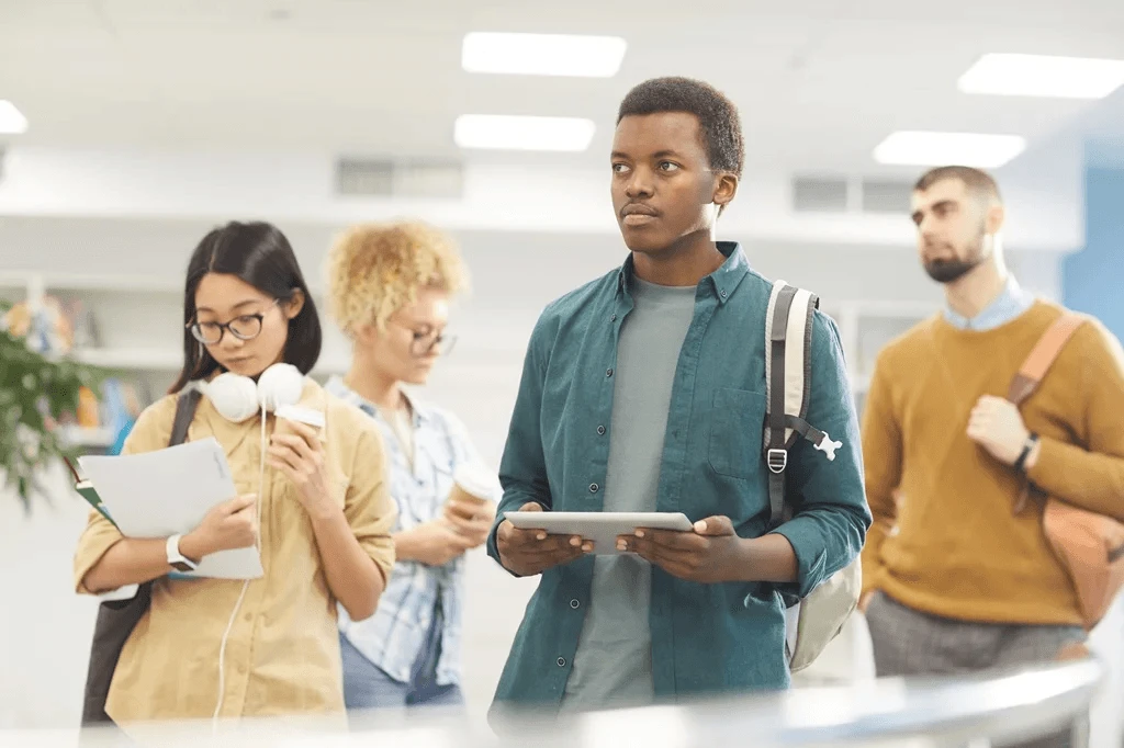 Group Of College Students Waiting For An Interview