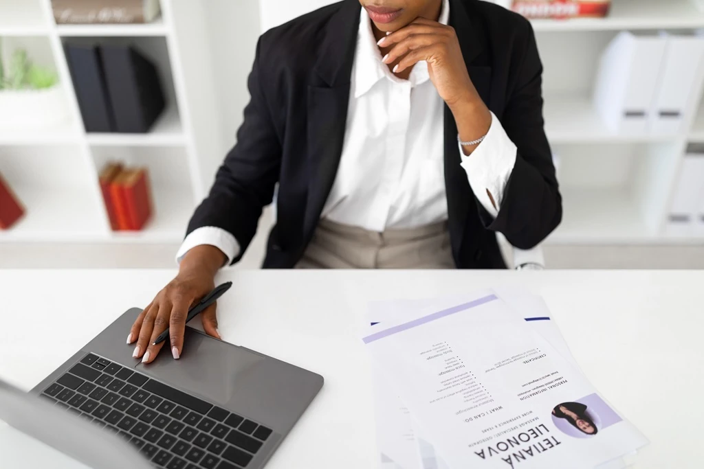 Hr Employee Studying A Professional Resume Formatting