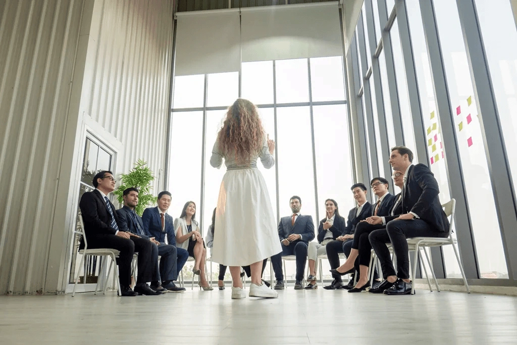 Professional Mentor Showing Samples Of Body Language In The Meeting