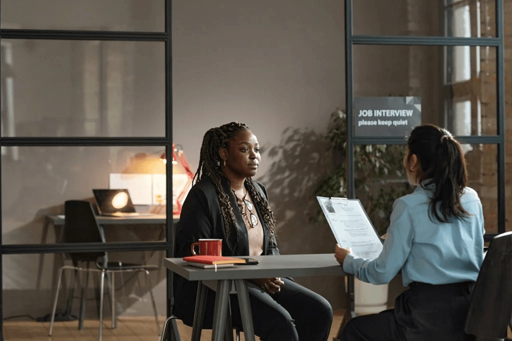 Recruiter Listening Attentively To The Conversive Applicant