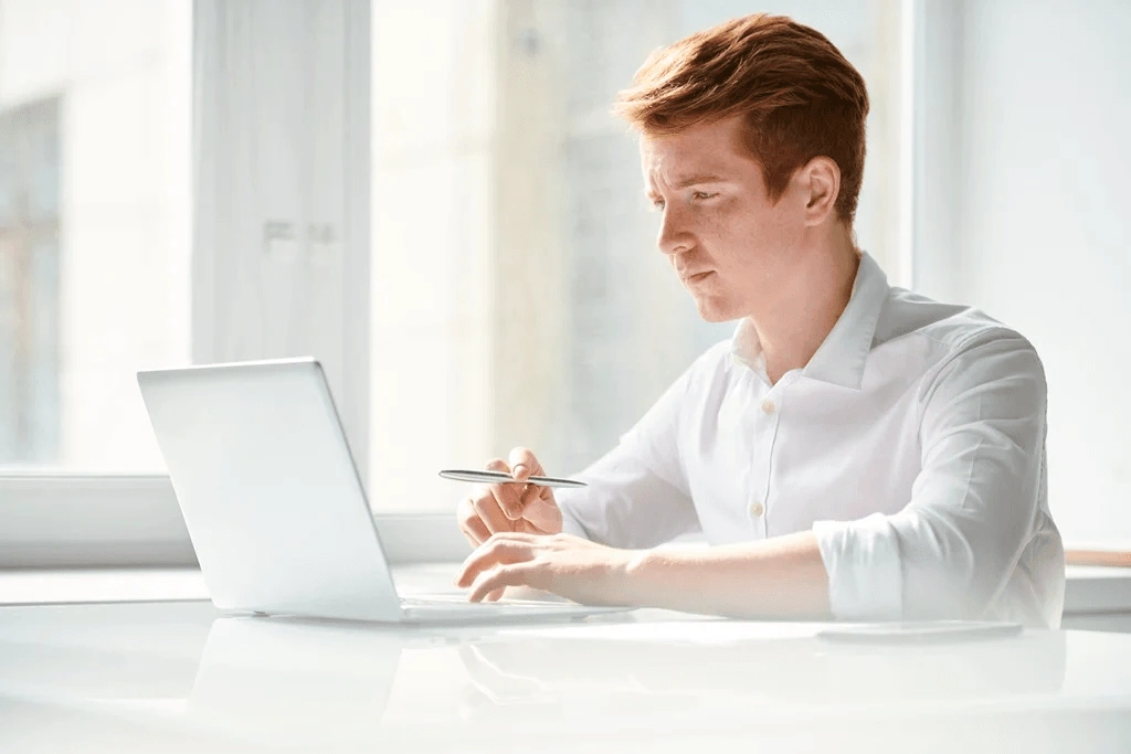 Serious Applicant Polishing His Resume Well