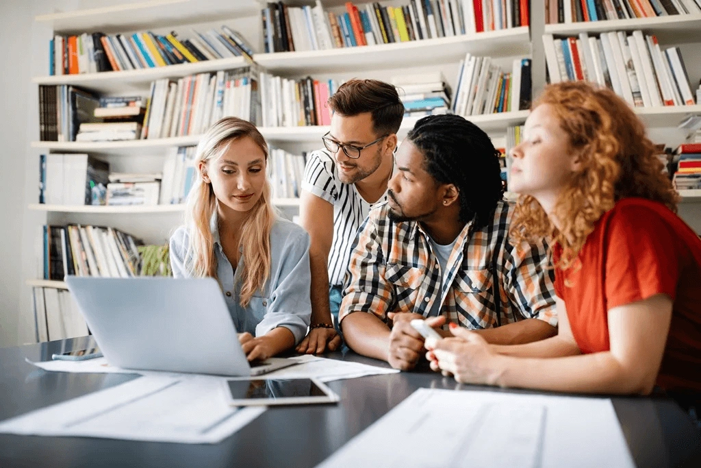 Employees Helping Each Other To Learn Other Expertise