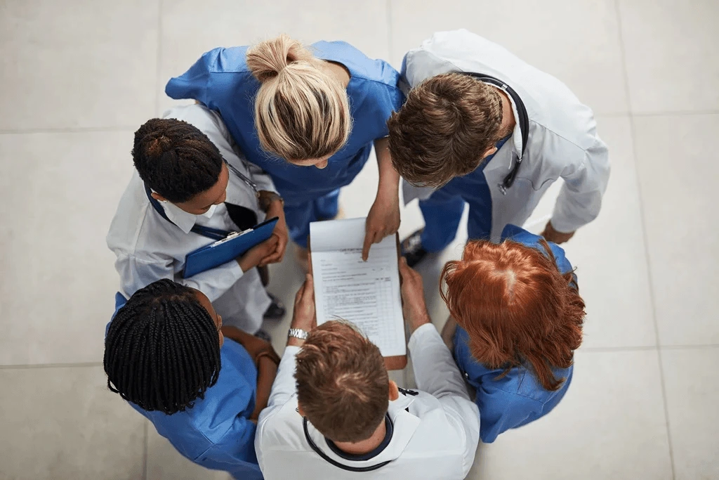 Head Nurse Leading A Strategy For Each Other Shift