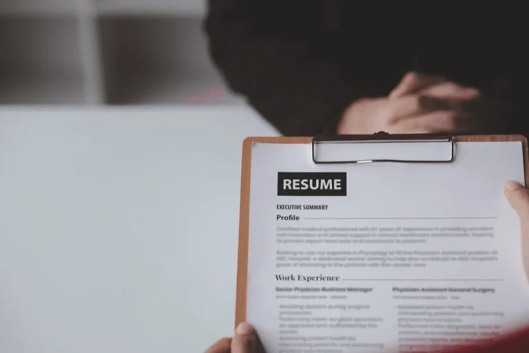 interview featuring a resume with effective resume adjectives