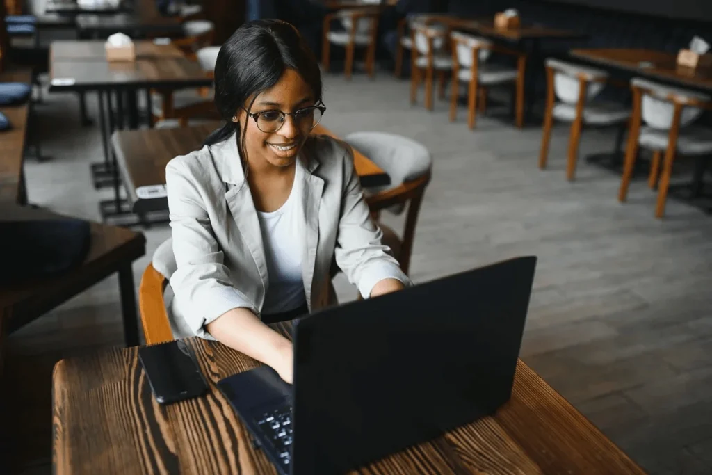 Job Seeker Using A Resume Builder For Her Application