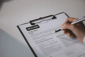 recruiter checking on the professionalism of an applicant's resume