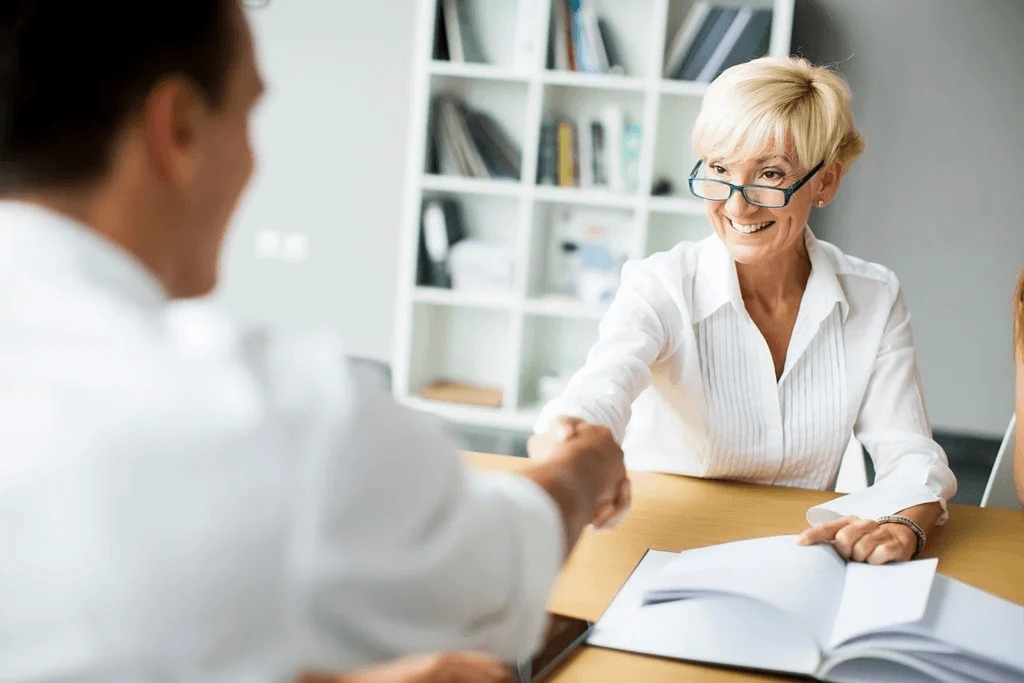 Recruiter Welcoming The Career Development Manager Applicant To The Team