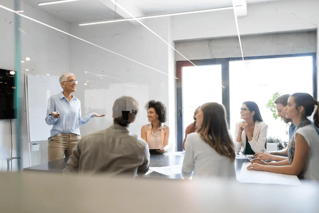 Resume Builder Experts Strategizing In A Meeting