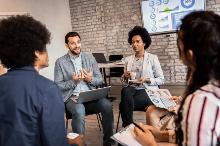 workplace mentor providing career development training to new employees