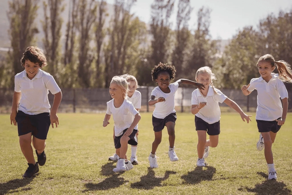 Young Players Running On The Field