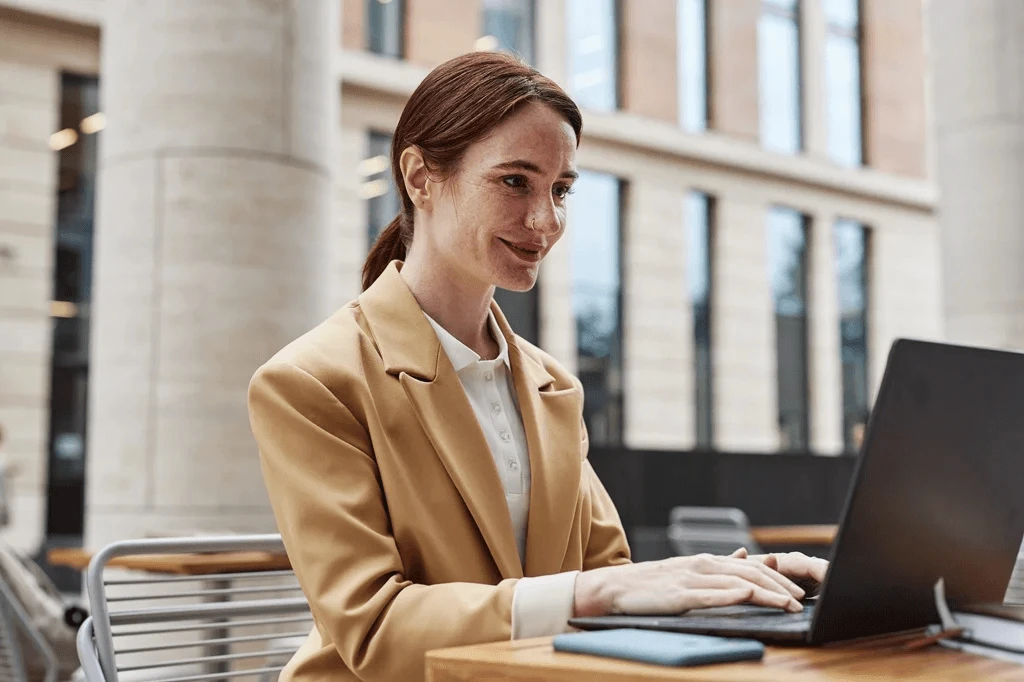 Aspiring Professional Optimizing Her Linkedin Profile Outdoors