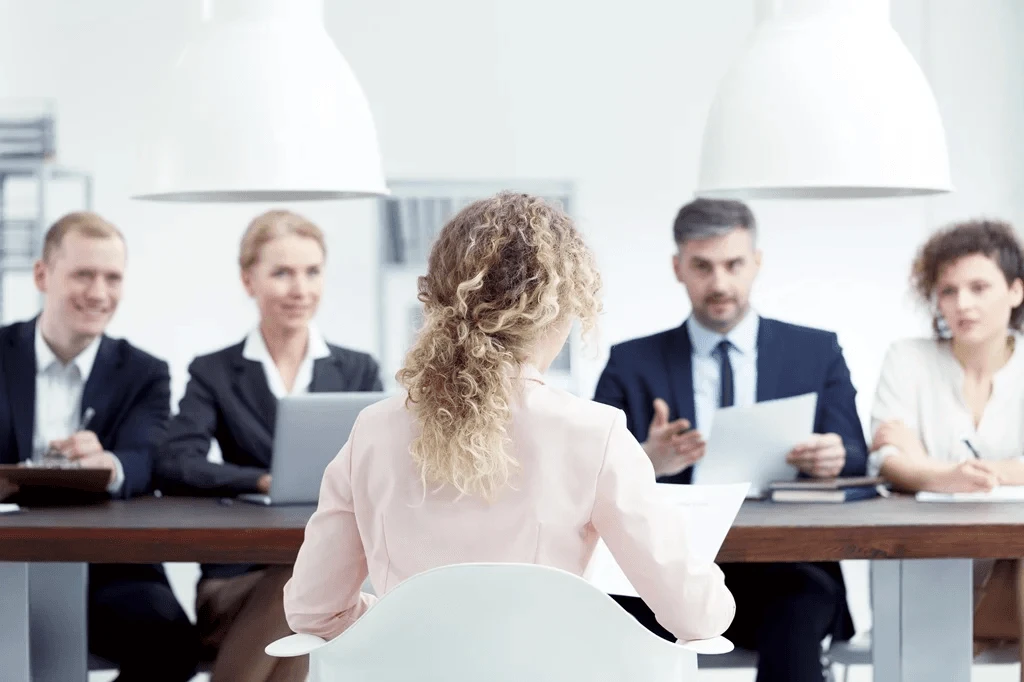 Job Applicant Being Interviewed By A Panel Of Respondents