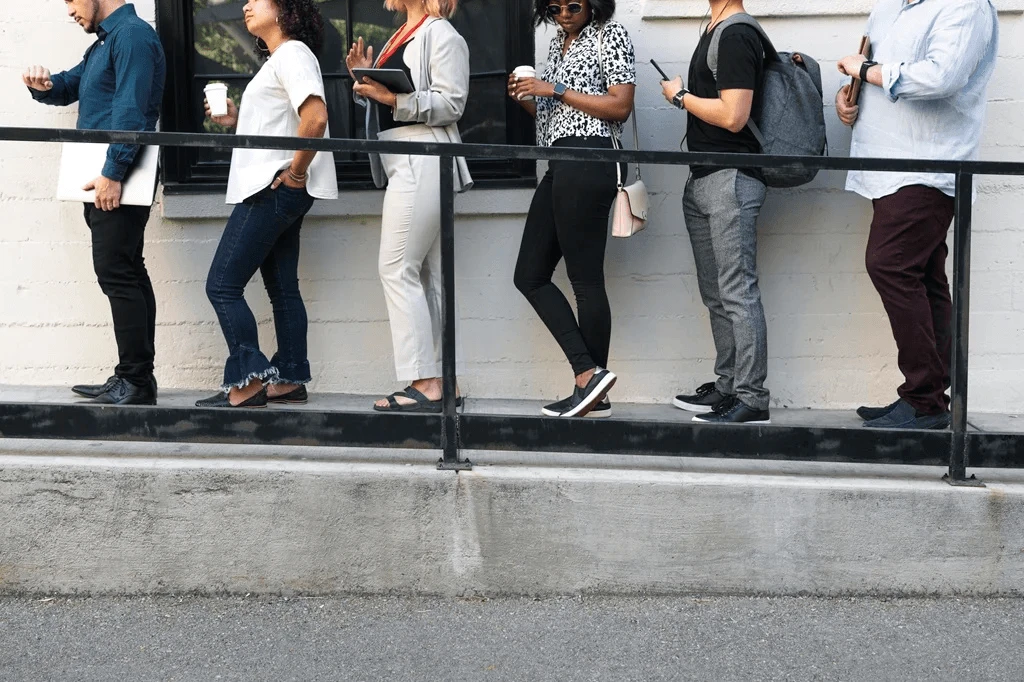 Job Applicants Falling In Line For An Interview