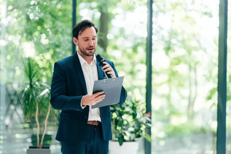 male professional presenting an impressive speech in an event