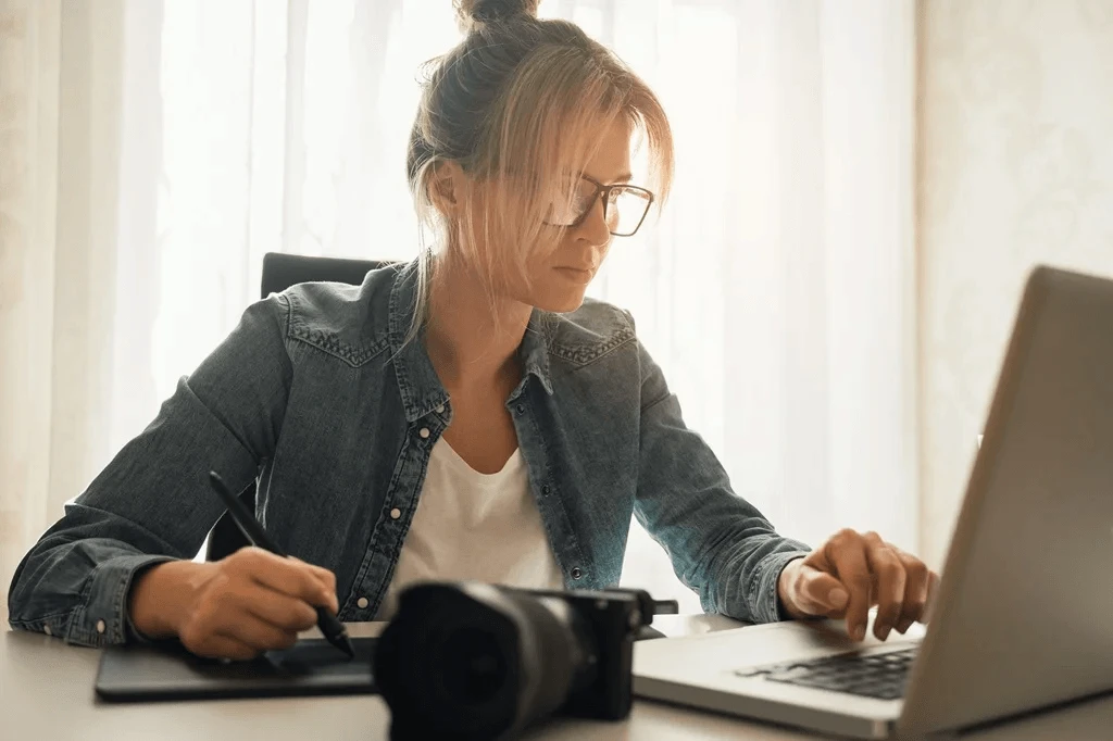 Photographer Writing A Blog Post For Her Personal Website