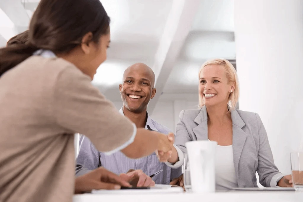 Recruiters Congratulating A Job Applicant After An Interview