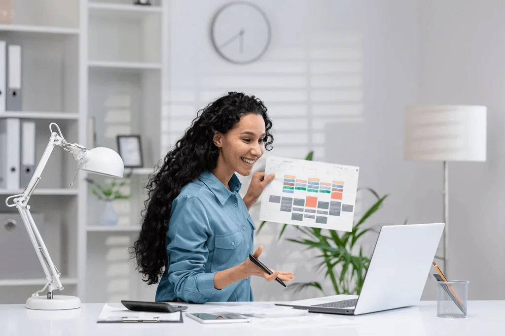 Employee Discussing Their Dupont Work Schedule To Her Colleagues Virtually