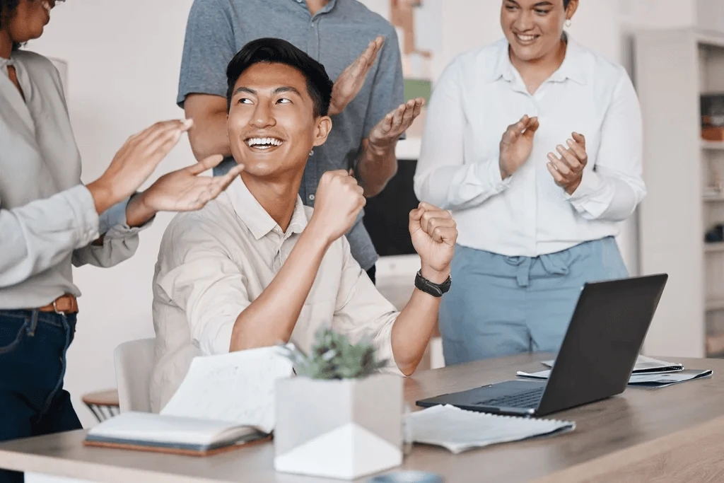 New Employee Being Applauded For His Performance