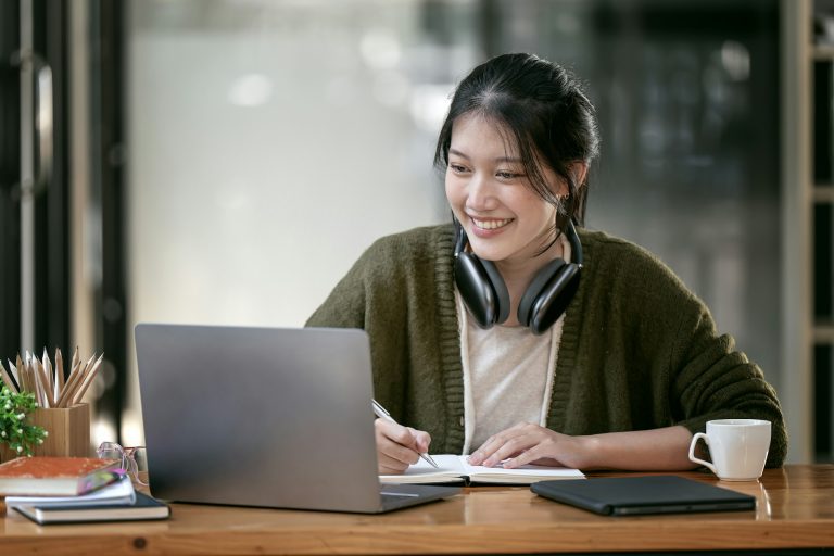 Portrait confident young female college student preparing for her statement of purpose sample letter