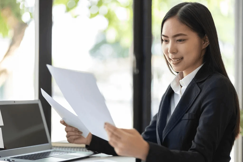 Applicant Evaluating Her Resume For Errors