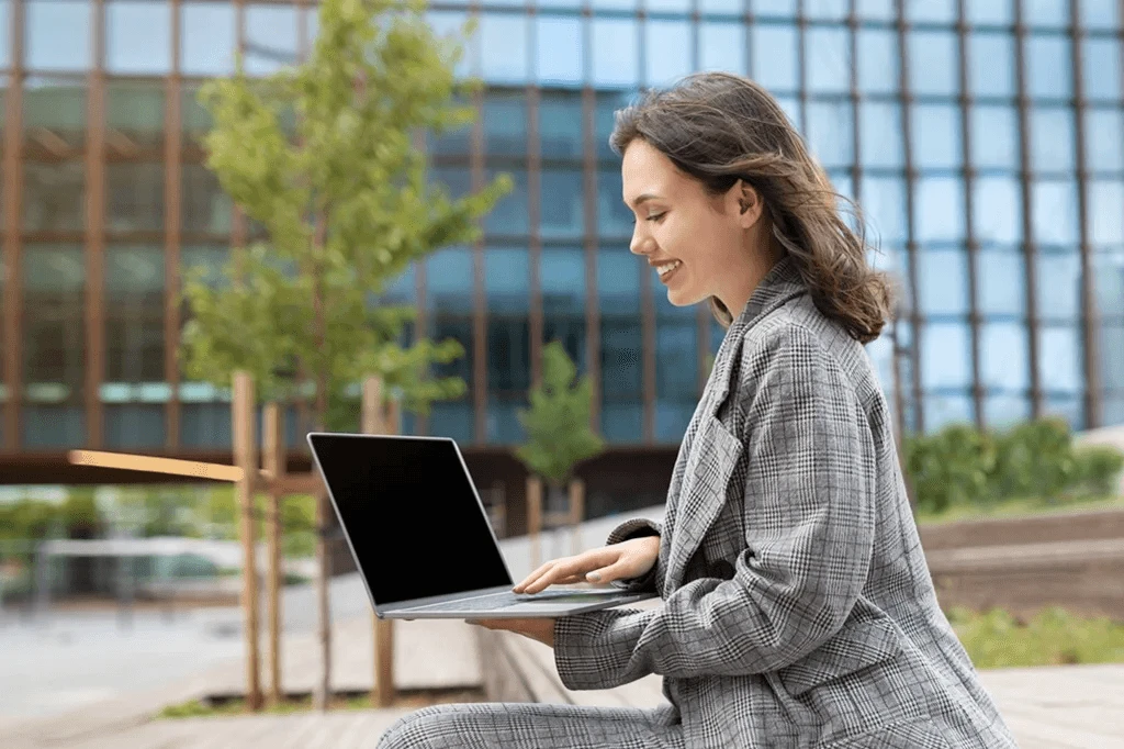 Aspiring Professional Using Her Laptop To Research For Situational Interview Questions