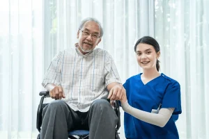 caregiver compassionately assisting an elderly individual