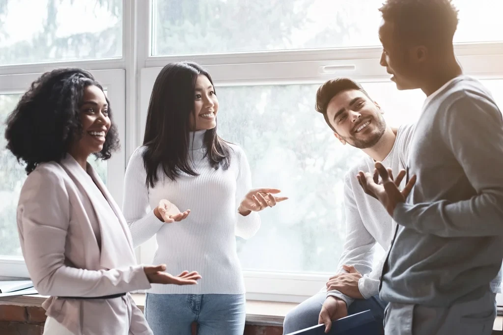 Cheerful Colleagues Having Small Talk