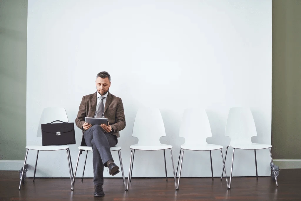 Job Applicant Preparing For His Turn To An Interview