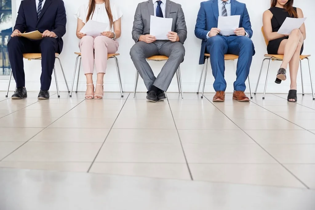 Job Applicants Falling In Line For An Interview